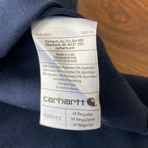 Carharrt short sleeve button down collar blue canvass. Has hidden zipup pocket - Picture 3 of 4